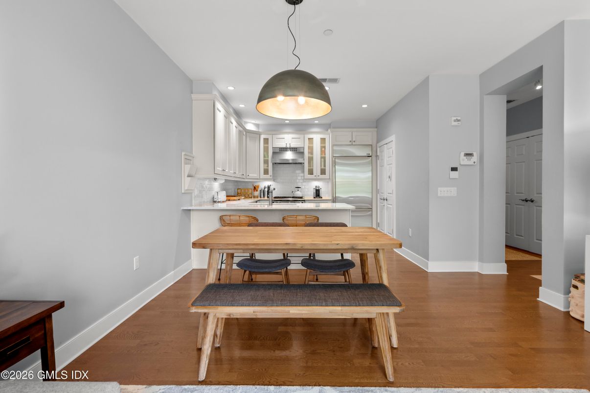 Dining room, Interior, Kitchen, Pendant Lights, Recessed Lighting, Stainless Steel Appliances, Wood Texture Flooring