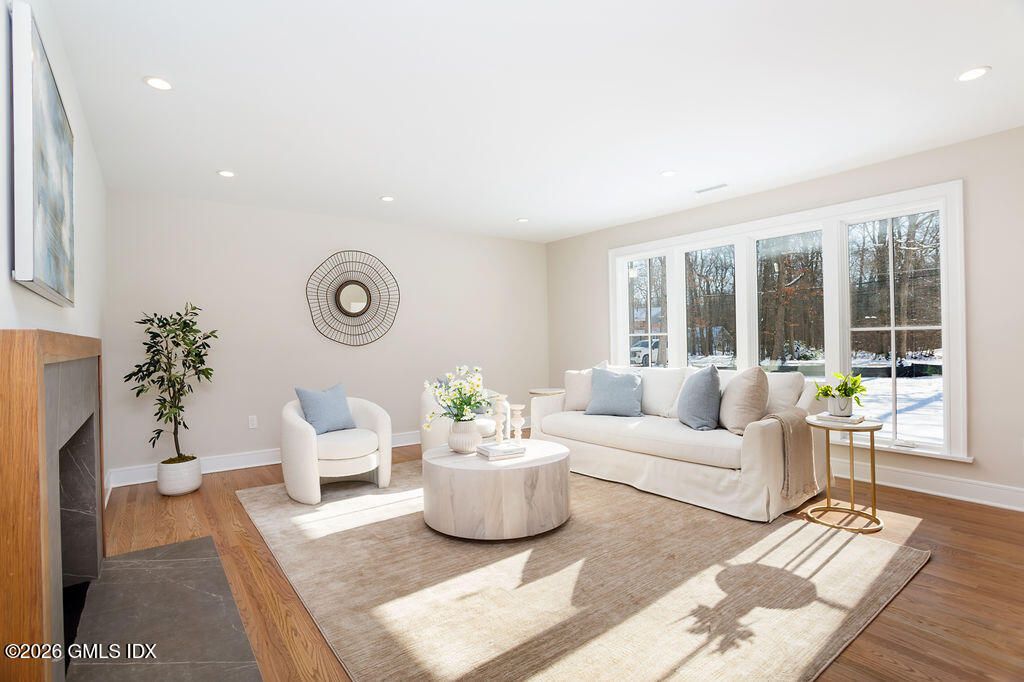 Fireplace, Interior, Living room, Recessed Lighting, Wood Texture Flooring