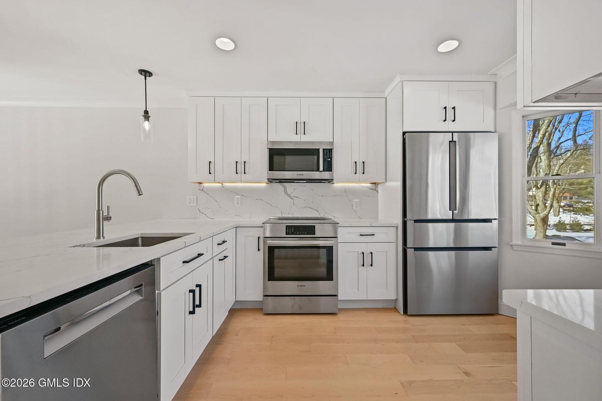 Interior, Kitchen, Pendant Lights, Recessed Lighting, Stainless Steel Appliances, Wood Texture Flooring