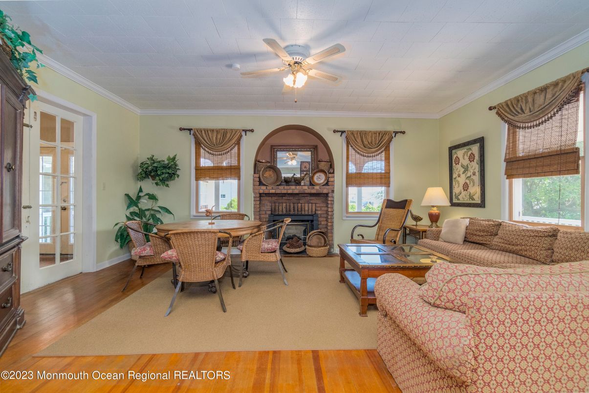 Dining room, Fireplace, Interior, Living room, Wood Texture Flooring