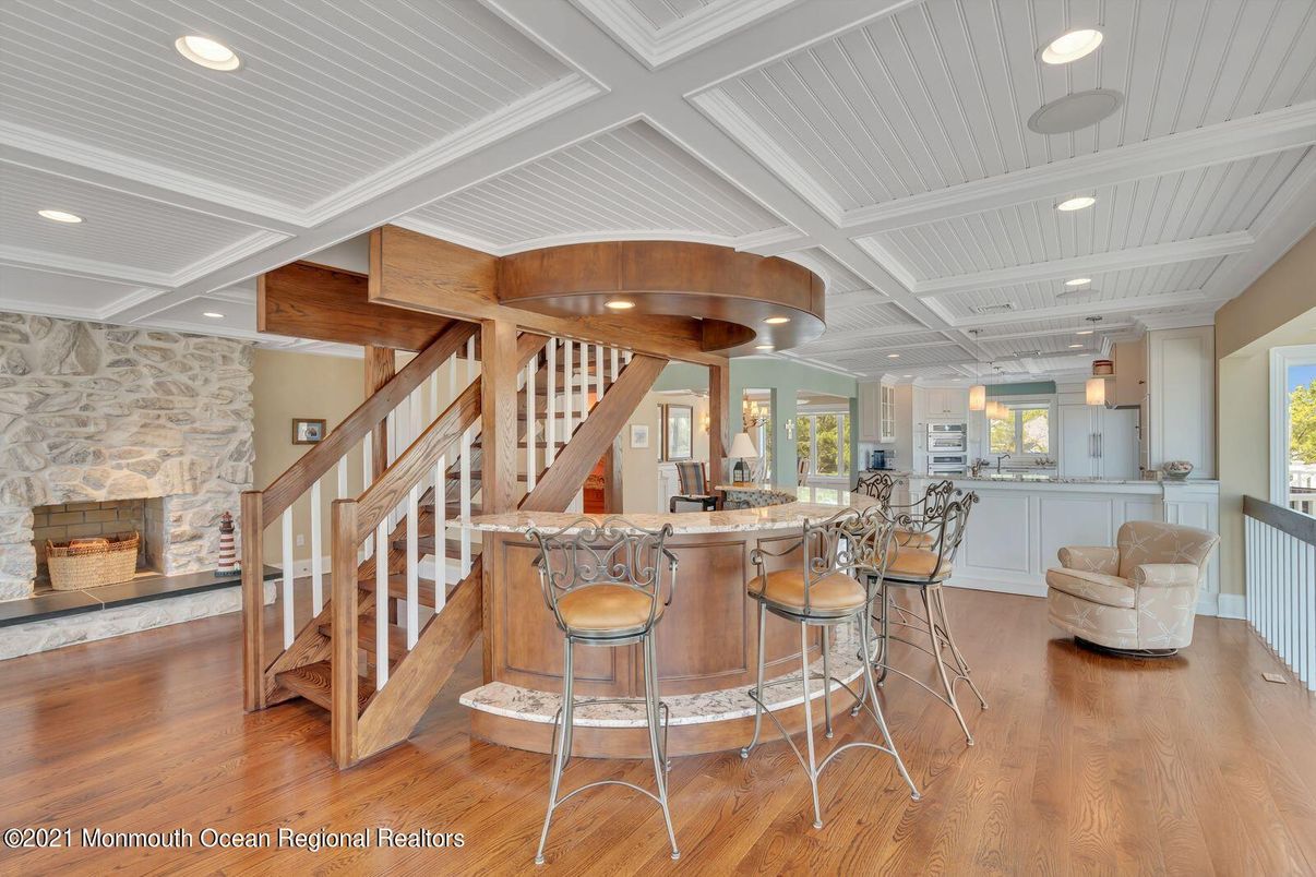 Fireplace, Interior, Recessed Lighting, Stone Walls, Wood Texture Flooring