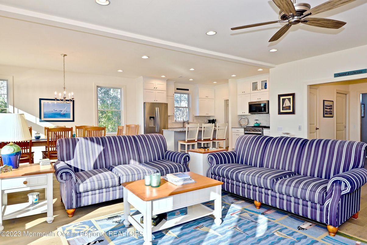 Dining room, Interior, Kitchen, Living room, Pendant Lights, Recessed Lighting, Stainless Steel Appliances, Wood Texture Flooring