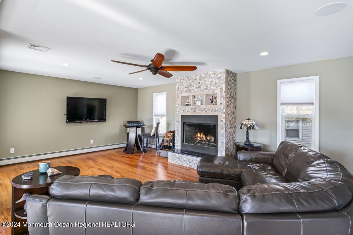 Fireplace, Interior, Living room, Recessed Lighting, Wood Texture Flooring