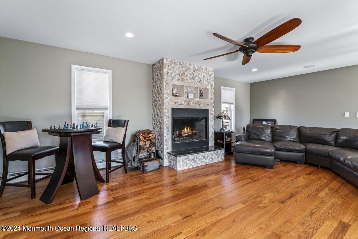 Fireplace, Interior, Living room, Recessed Lighting, Wood Texture Flooring