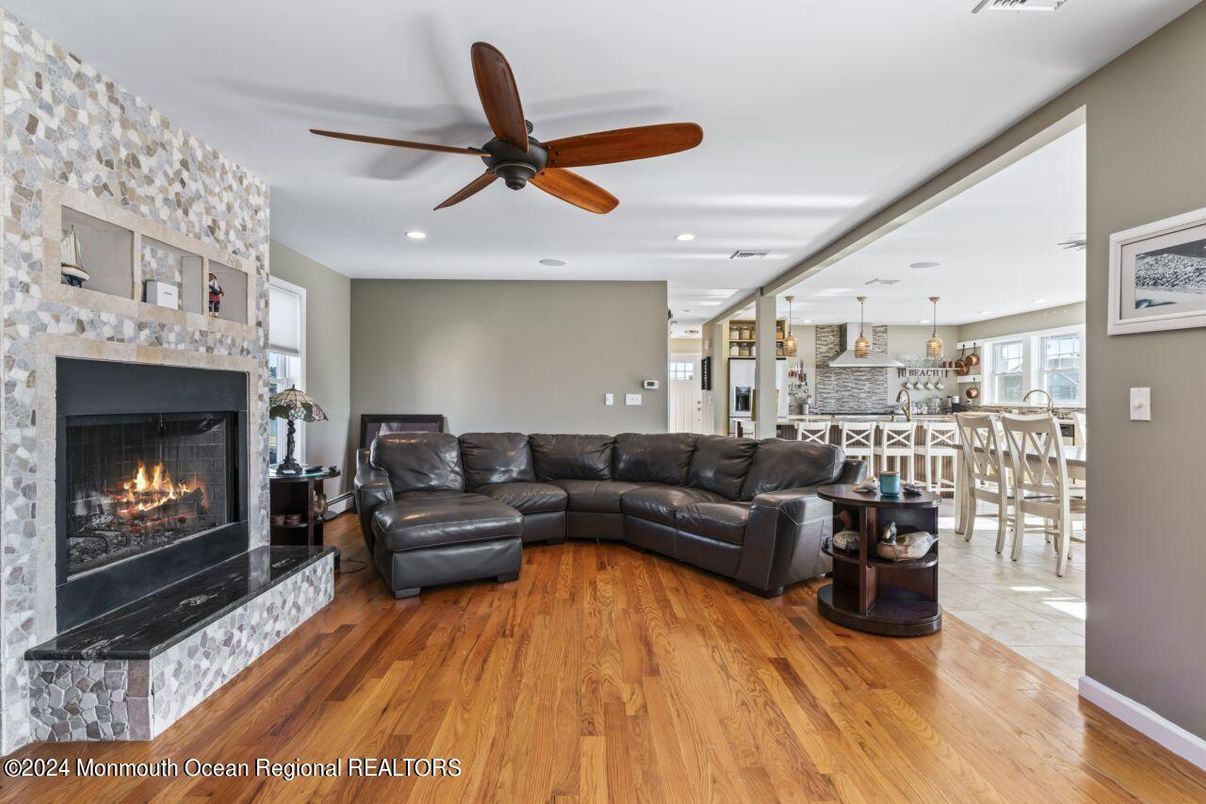 Dining room, Fireplace, Interior, Kitchen, Living room, Pendant Lights, Recessed Lighting, Stone Walls, Wood Texture Flooring