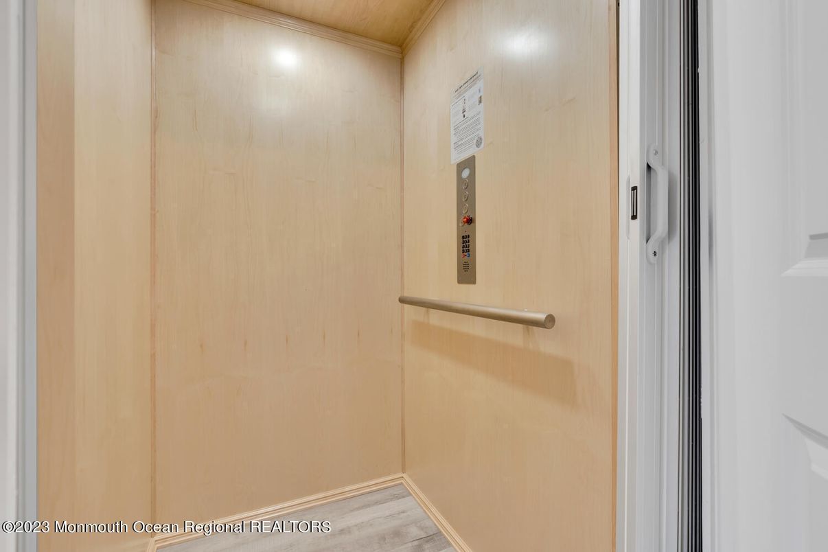 Elevator, Interior, Recessed Lighting, Wood Texture Flooring, Wooden Walls