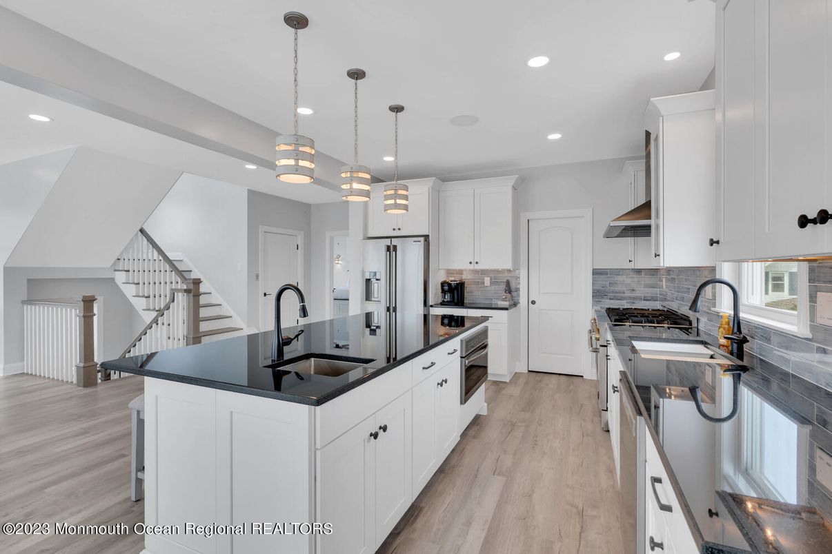 Interior, Kitchen, Pendant Lights, Recessed Lighting, Stainless Steel Appliances, Wood Texture Flooring