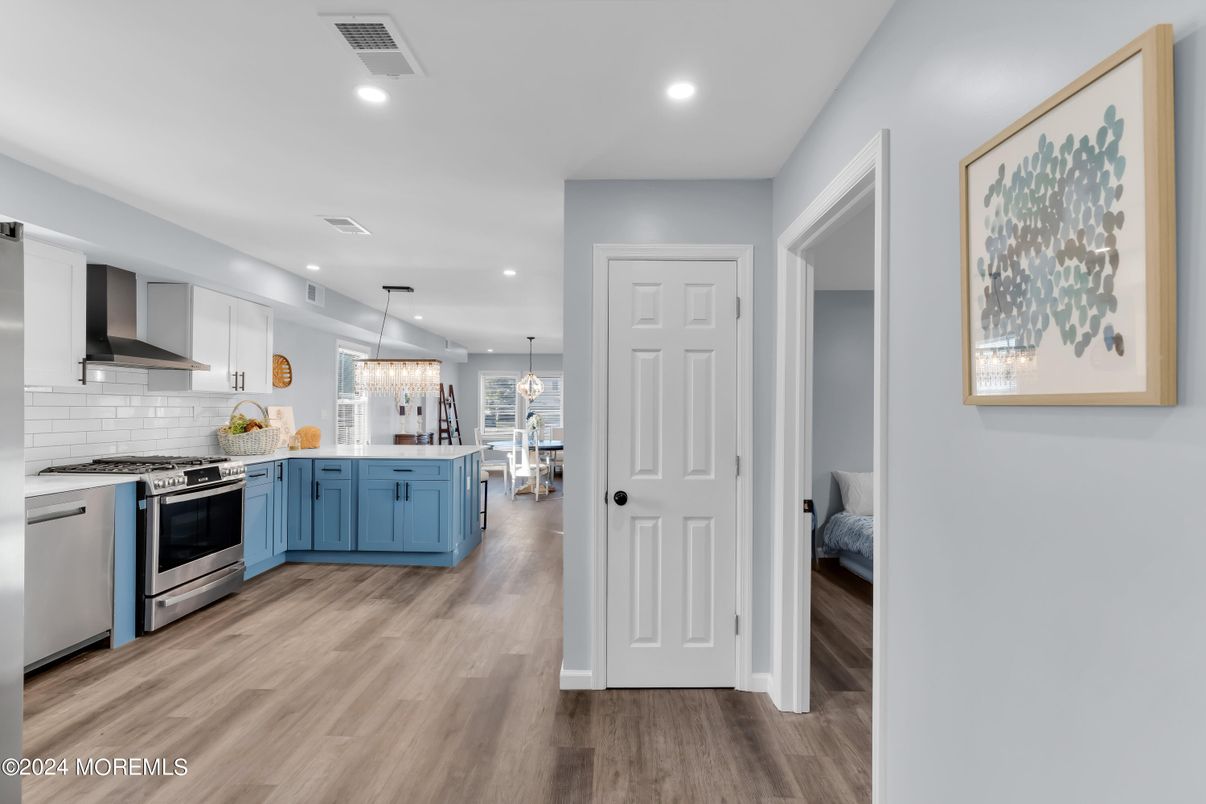 Interior, Kitchen, Pendant Lights, Recessed Lighting, Stainless Steel Appliances, Wood Texture Flooring