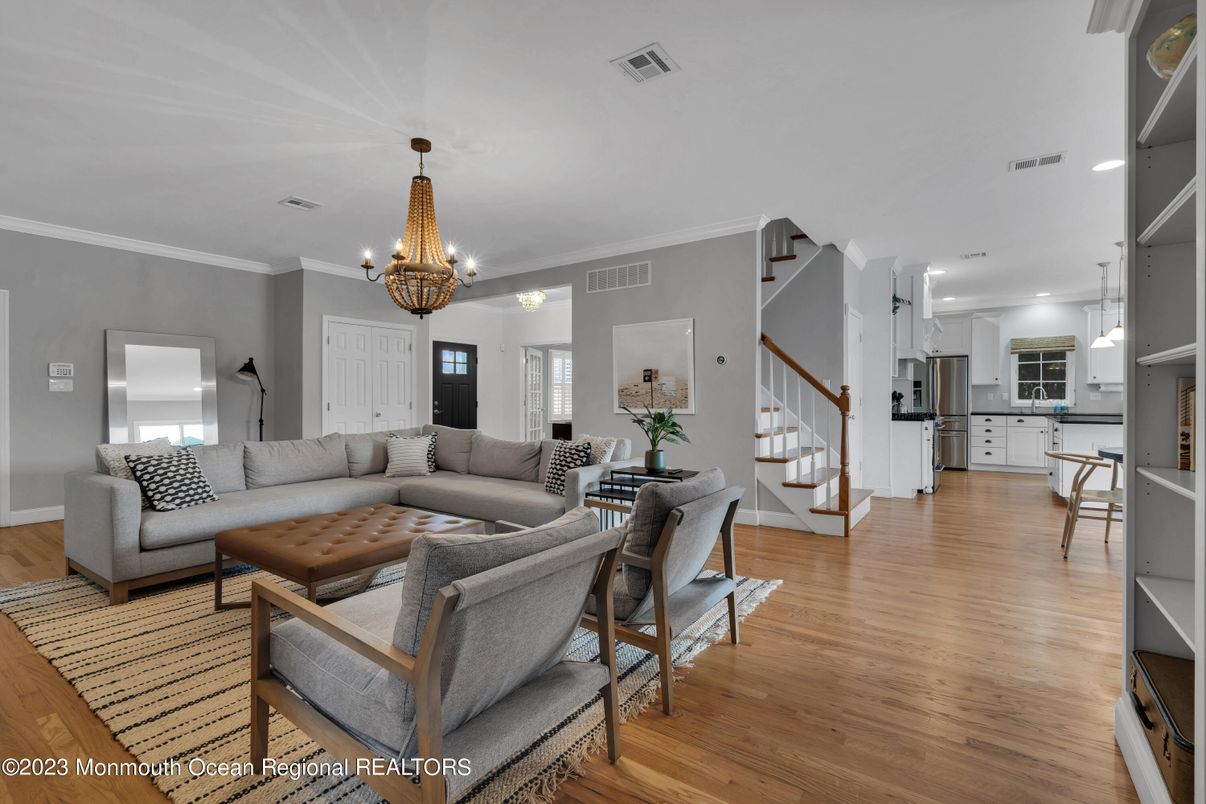 Chandelier, Dining room, Interior, Kitchen, Living room, Recessed Lighting, Stainless Steel Appliances, Wood Texture Flooring