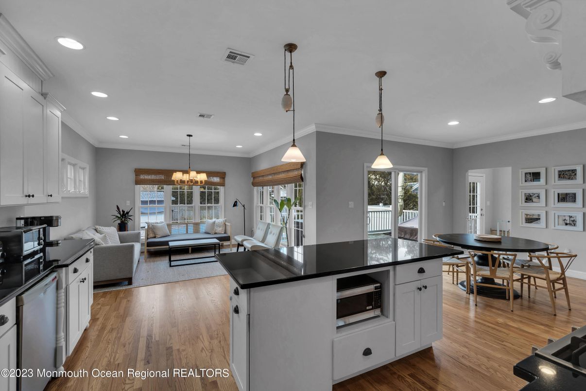 Chandelier, Dining room, Interior, Kitchen, Living room, Pendant Lights, Recessed Lighting, Wood Texture Flooring