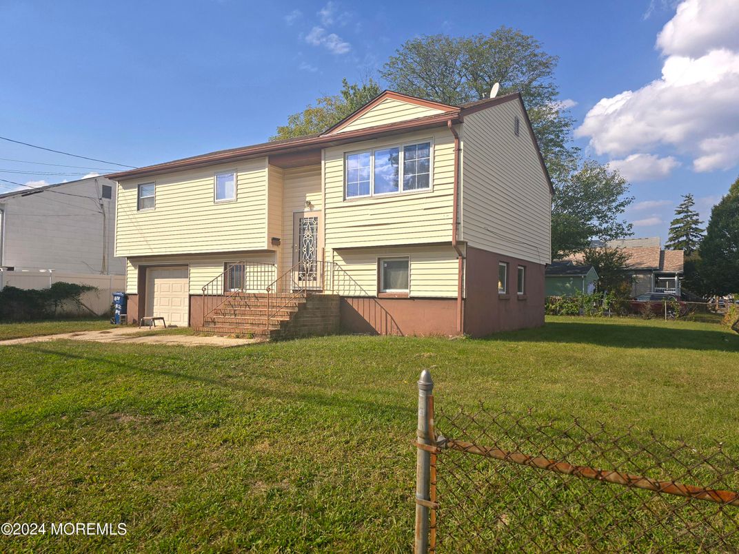 Attached, Backyard, Exterior, Facade, Raised Ranch