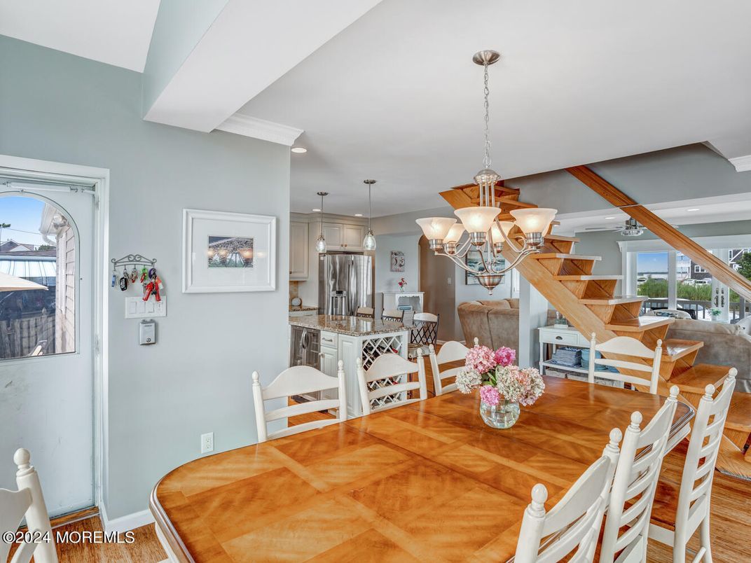 Chandelier, Dining room, Interior, Kitchen, Pendant Lights, Recessed Lighting, Wooden Beams, Wood Texture Flooring