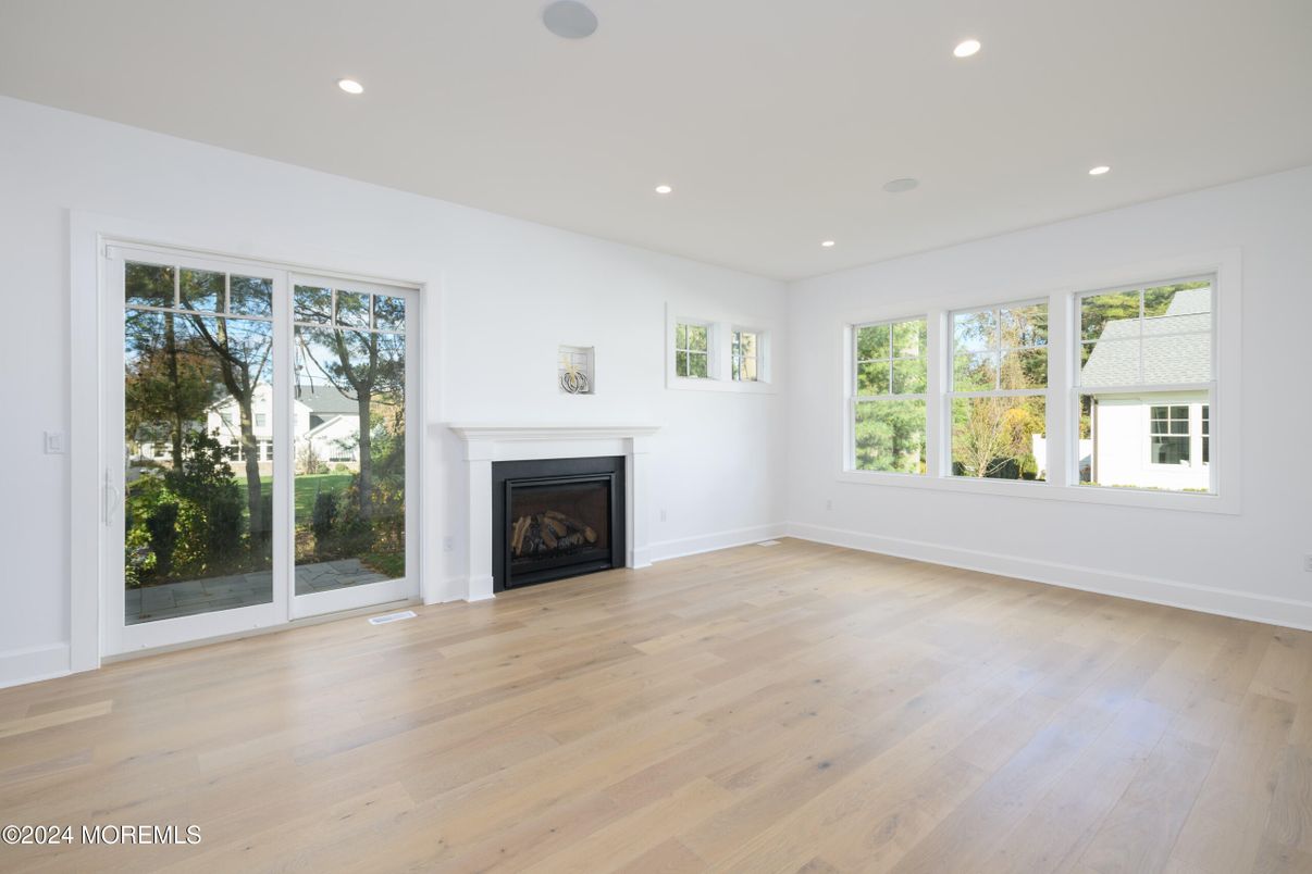 Empty room, Fireplace, Interior, Recessed Lighting, Wood Texture Flooring