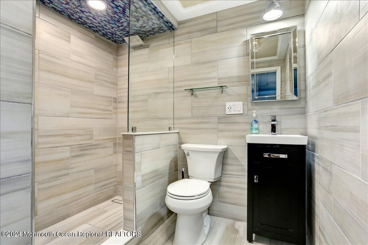 Bathroom, Glass Shower, Interior, Recessed Lighting, Wood Texture Flooring