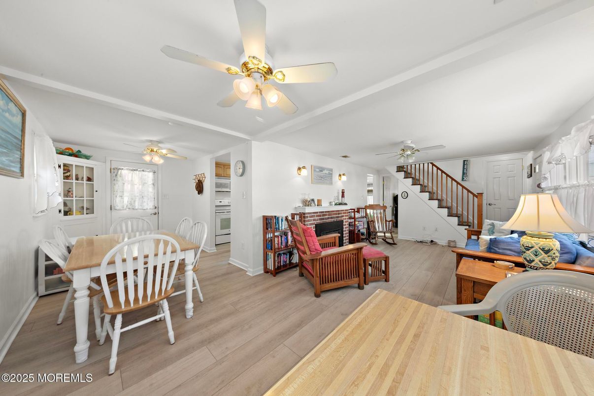 Dining room, Fireplace, Interior, Living room, Wood Texture Flooring