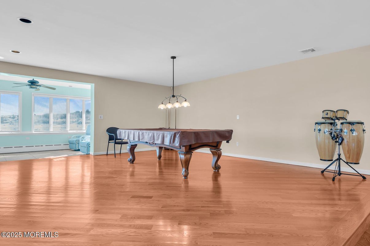 Billiard Table, Game Room, Interior, Pendant Lights, Piano, Recessed Lighting, Wood Texture Flooring