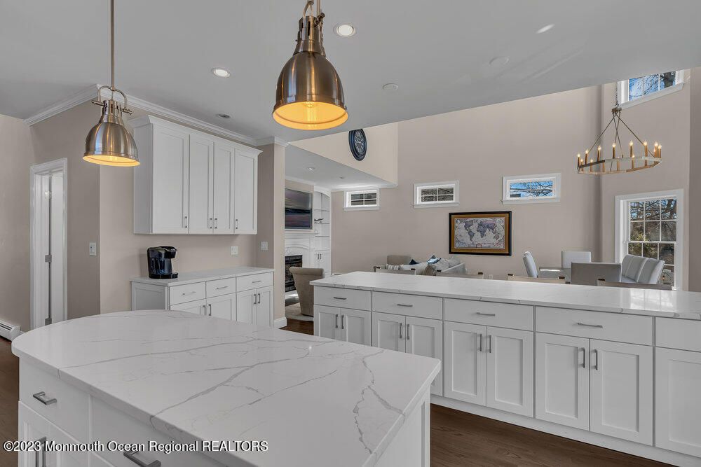 Dining room, Fireplace, Interior, Kitchen, Pendant Lights, Recessed Lighting, Wood Texture Flooring