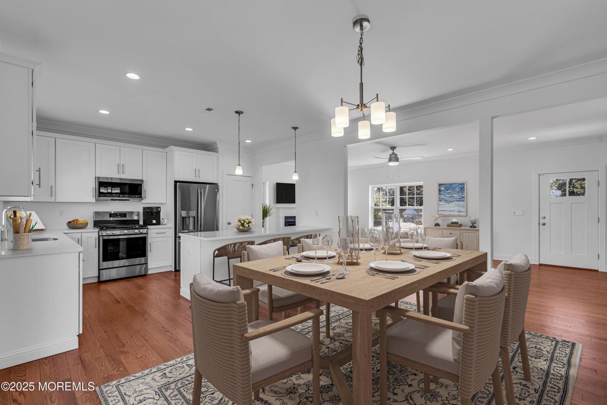 Dining room, Interior, Kitchen, Pendant Lights, Recessed Lighting, Stainless Steel Appliances, Wood Texture Flooring
