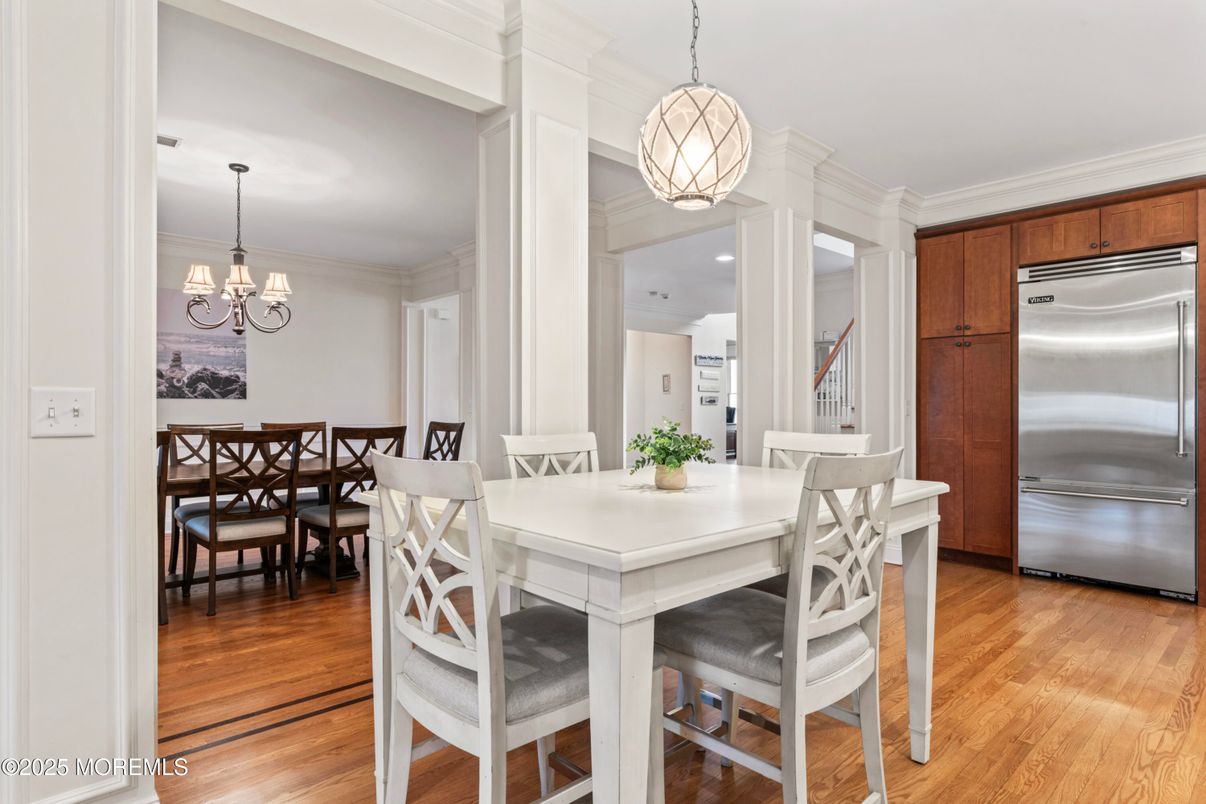 Chandelier, Dining room, Interior, Kitchen, Pendant Lights, Recessed Lighting, Stainless Steel Appliances, Wood Texture Flooring
