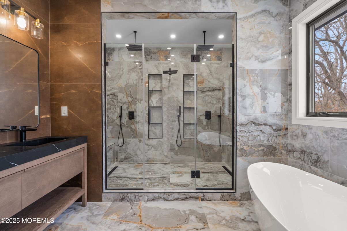 Bathroom, Dual Sink Vanities, Free Standing Baths, Glass Shower, Interior, Marble Walls, Recessed Lighting
