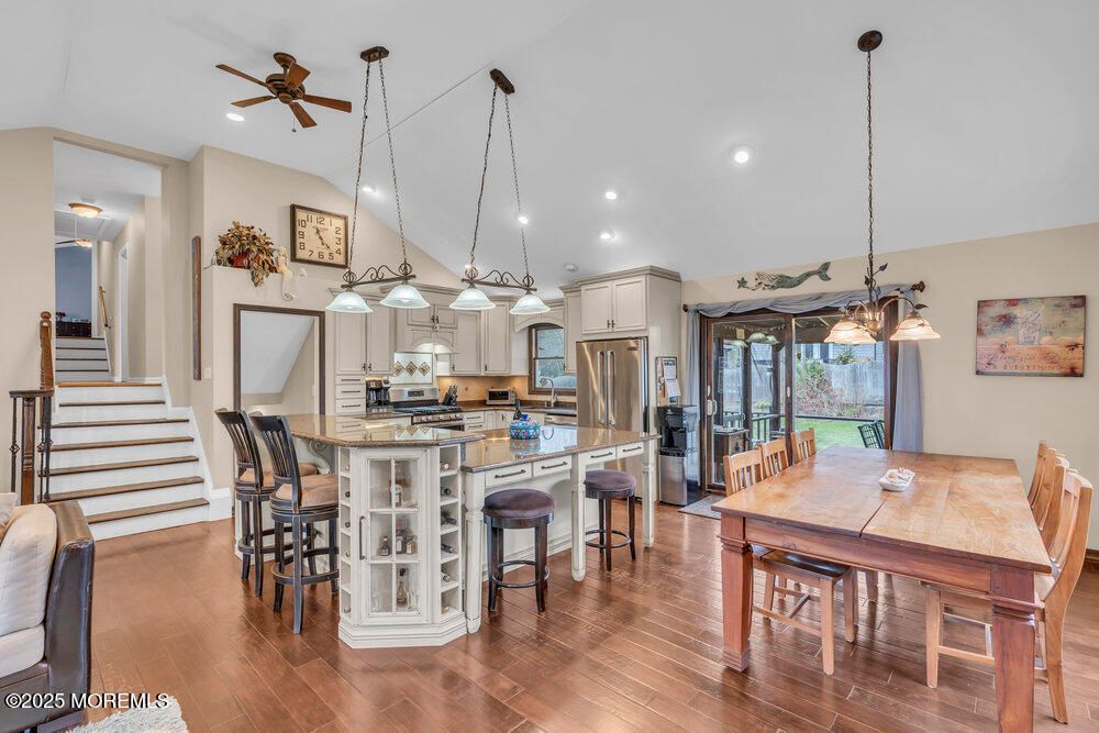Dining room, Interior, Kitchen, Pendant Lights, Recessed Lighting, Stainless Steel Appliances, Wood Texture Flooring