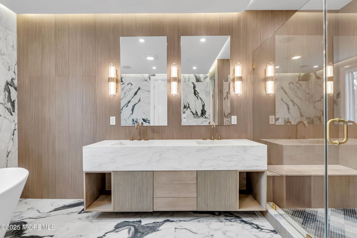 Bathroom, Dual Sink Vanities, Glass Shower, Interior, Marble, Marble Walls, Recessed Lighting