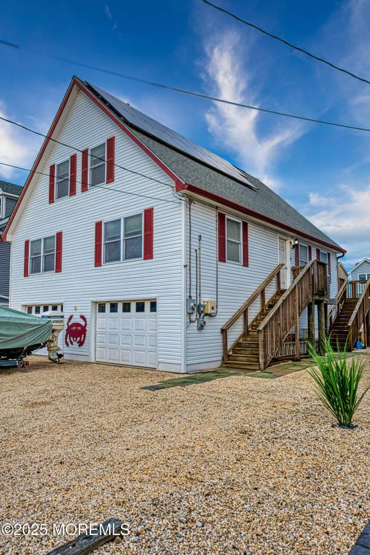Attached, Exterior, Facade, Solar Panels, Queen Anne Victorian