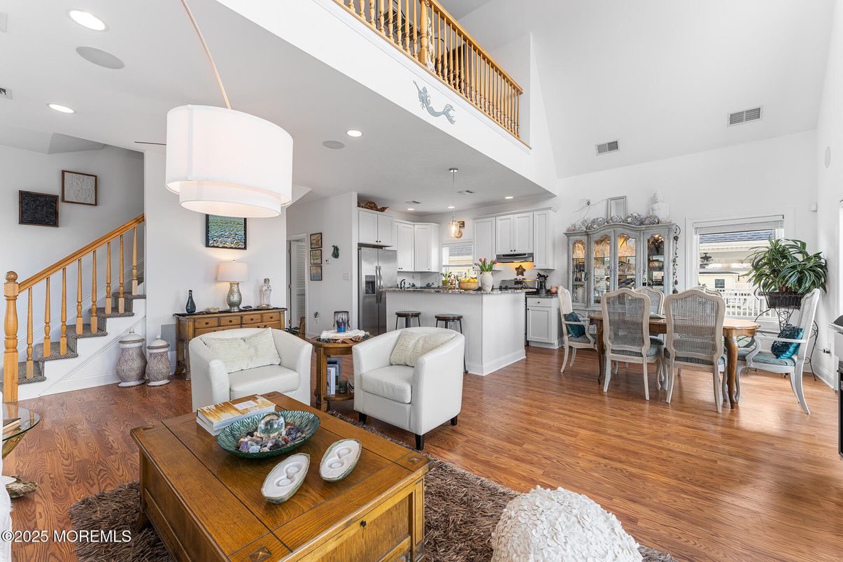 Dining room, Interior, Kitchen, Living room, Pendant Lights, Recessed Lighting, Stainless Steel Appliances, Wood Texture Flooring