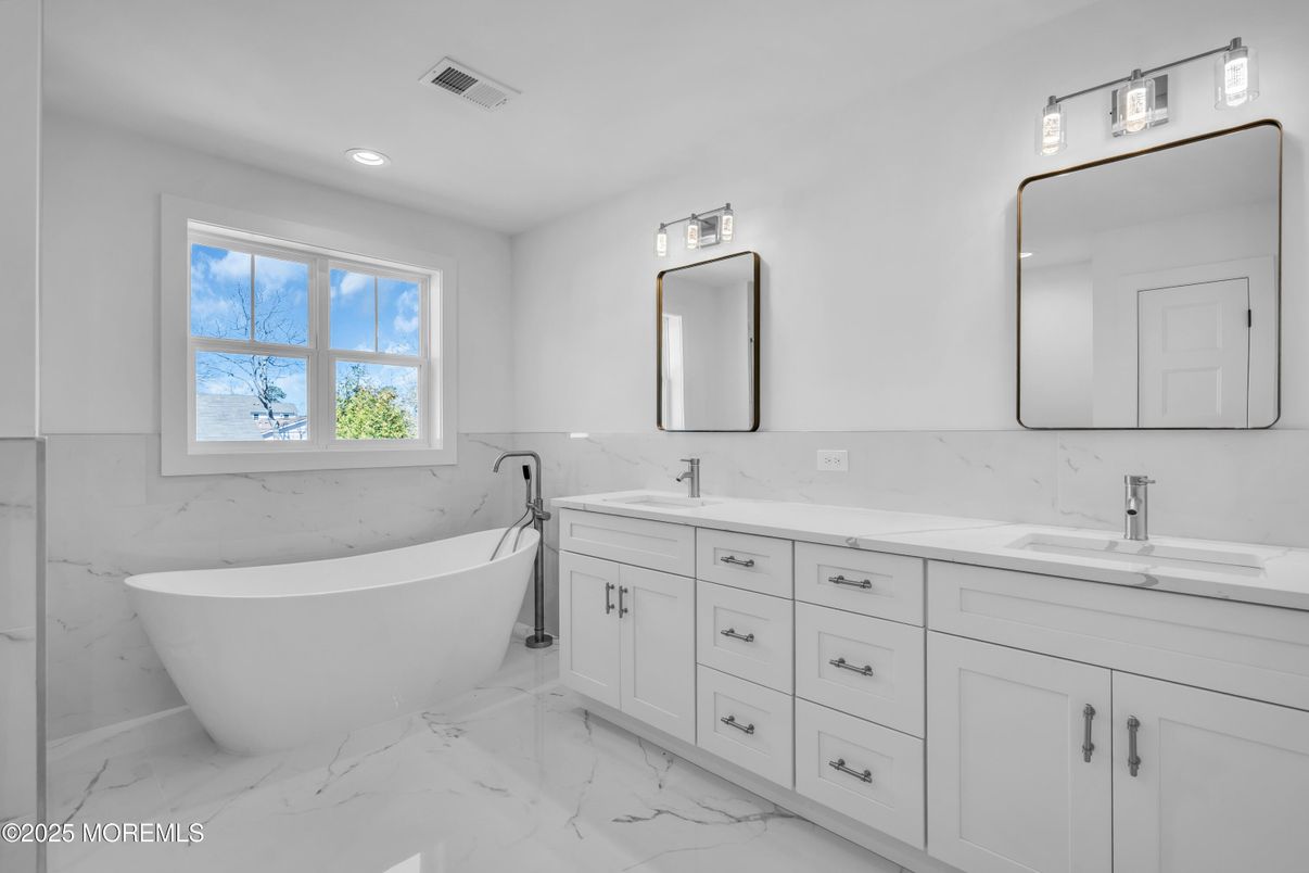Bathroom, Dual Sink Vanities, Free Standing Baths, Interior, Marble, Marble Walls, Recessed Lighting