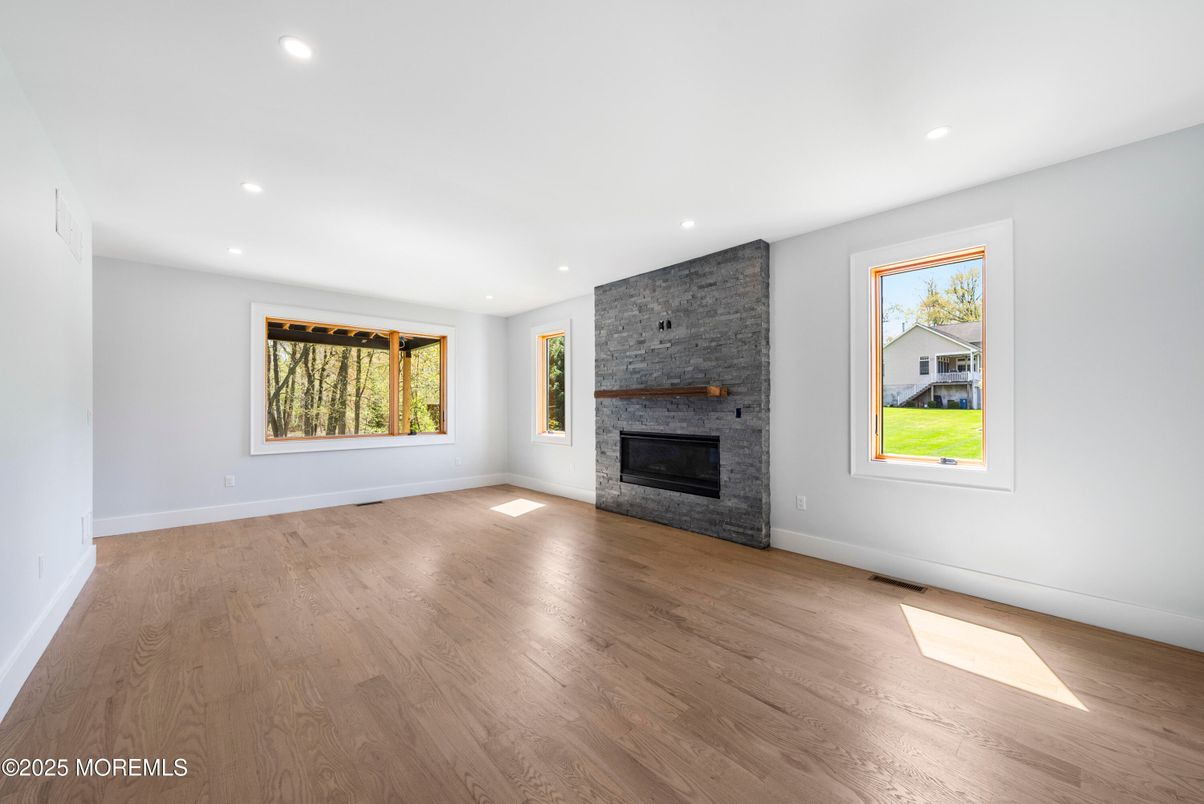 Empty room, Fireplace, Interior, Recessed Lighting, Wood Texture Flooring