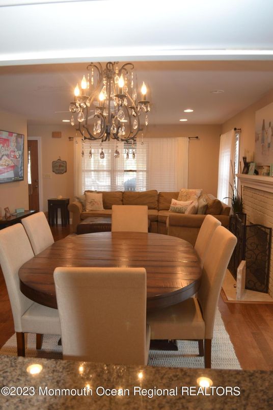 Chandelier, Dining room, Fireplace, Interior, Recessed Lighting, Wood Texture Flooring