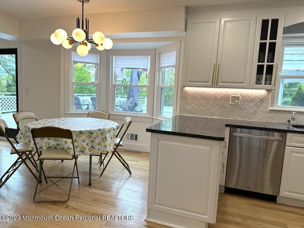 Dining room, Interior, Kitchen, Pendant Lights, Stainless Steel Appliances, Wood Texture Flooring