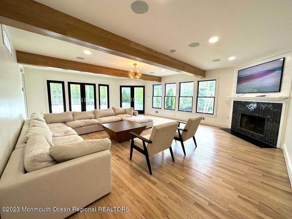 Dining room, Fireplace, Interior, Living room, Recessed Lighting, Wooden Beams, Wood Texture Flooring