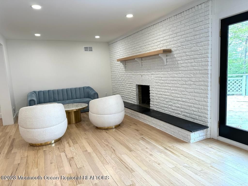 Fireplace, Interior, Recessed Lighting, Stone Walls, Wood Texture Flooring