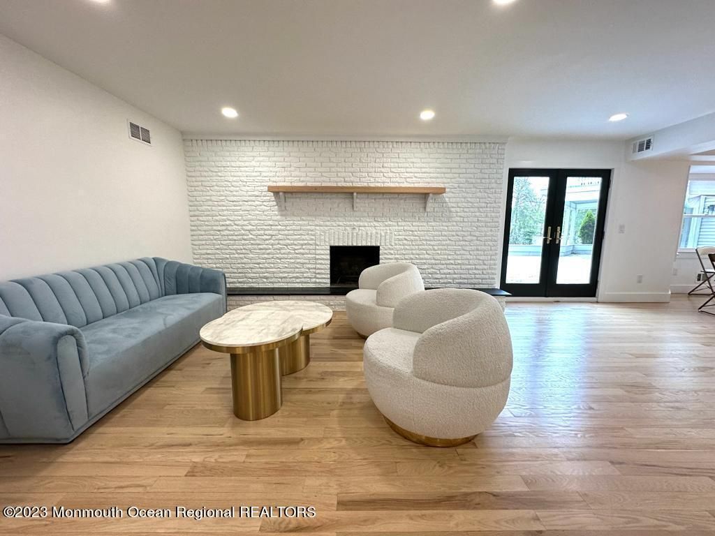 Fireplace, Interior, Recessed Lighting, Stone Walls, Wood Texture Flooring