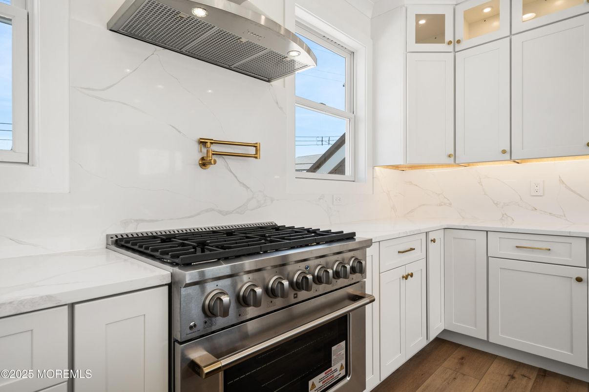 Interior, Kitchen, Marble Walls, Stainless Steel Appliances, Wood Texture Flooring