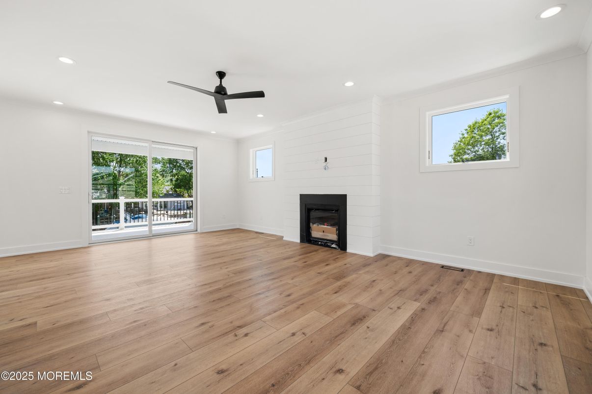 Empty room, Fireplace, Interior, Recessed Lighting, Wood Texture Flooring