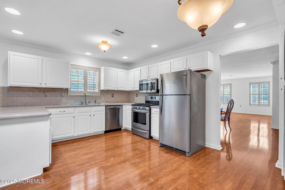 Interior, Kitchen, Recessed Lighting, Stainless Steel Appliances, Wood Texture Flooring