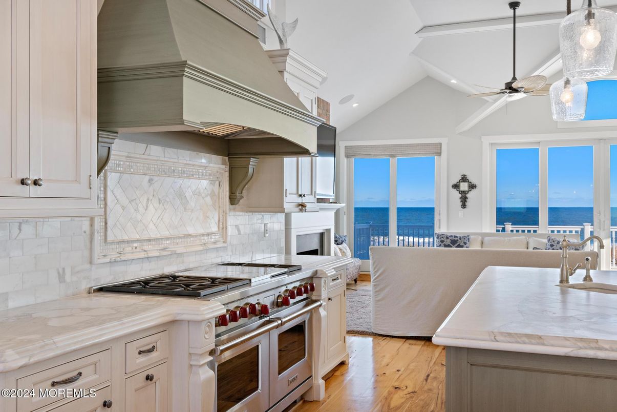 Interior, Kitchen, Living room, Pendant Lights, Recessed Lighting, Stainless Steel Appliances, Water, Wood Texture Flooring
