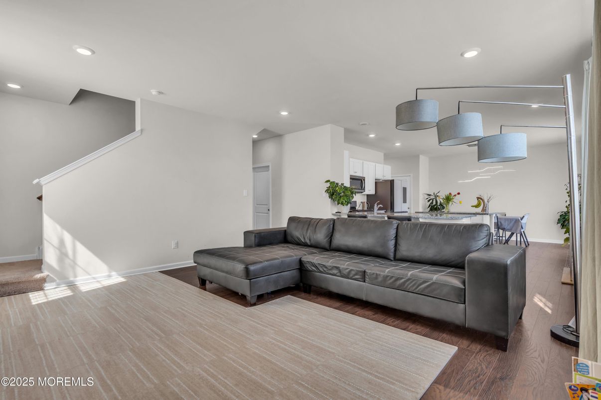 Dining room, Interior, Kitchen, Living room, Pendant Lights, Recessed Lighting, Stainless Steel Appliances, Wood Texture Flooring