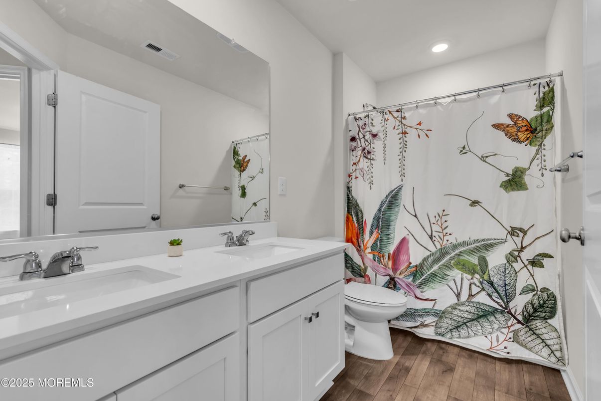 Bathroom, Dual Sink Vanities, Interior, Recessed Lighting, Wood Texture Flooring