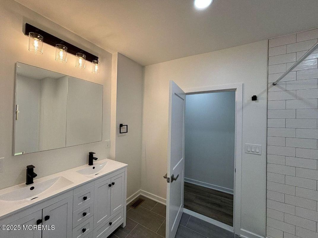Bathroom, Dual Sink Vanities, Interior, Recessed Lighting, Wood Texture Flooring