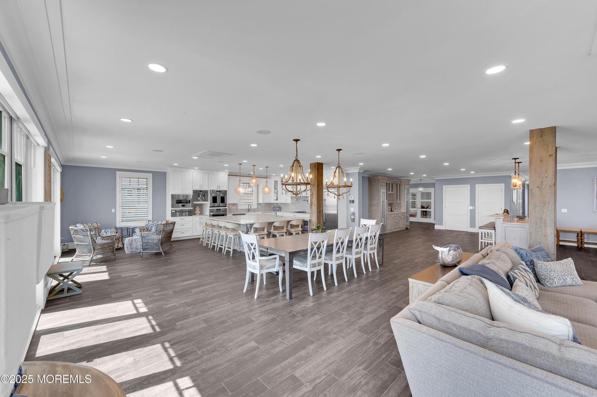 Dining room, Interior, Kitchen, Living room, Pendant Lights, Recessed Lighting, Stainless Steel Appliances, Wood Texture Flooring
