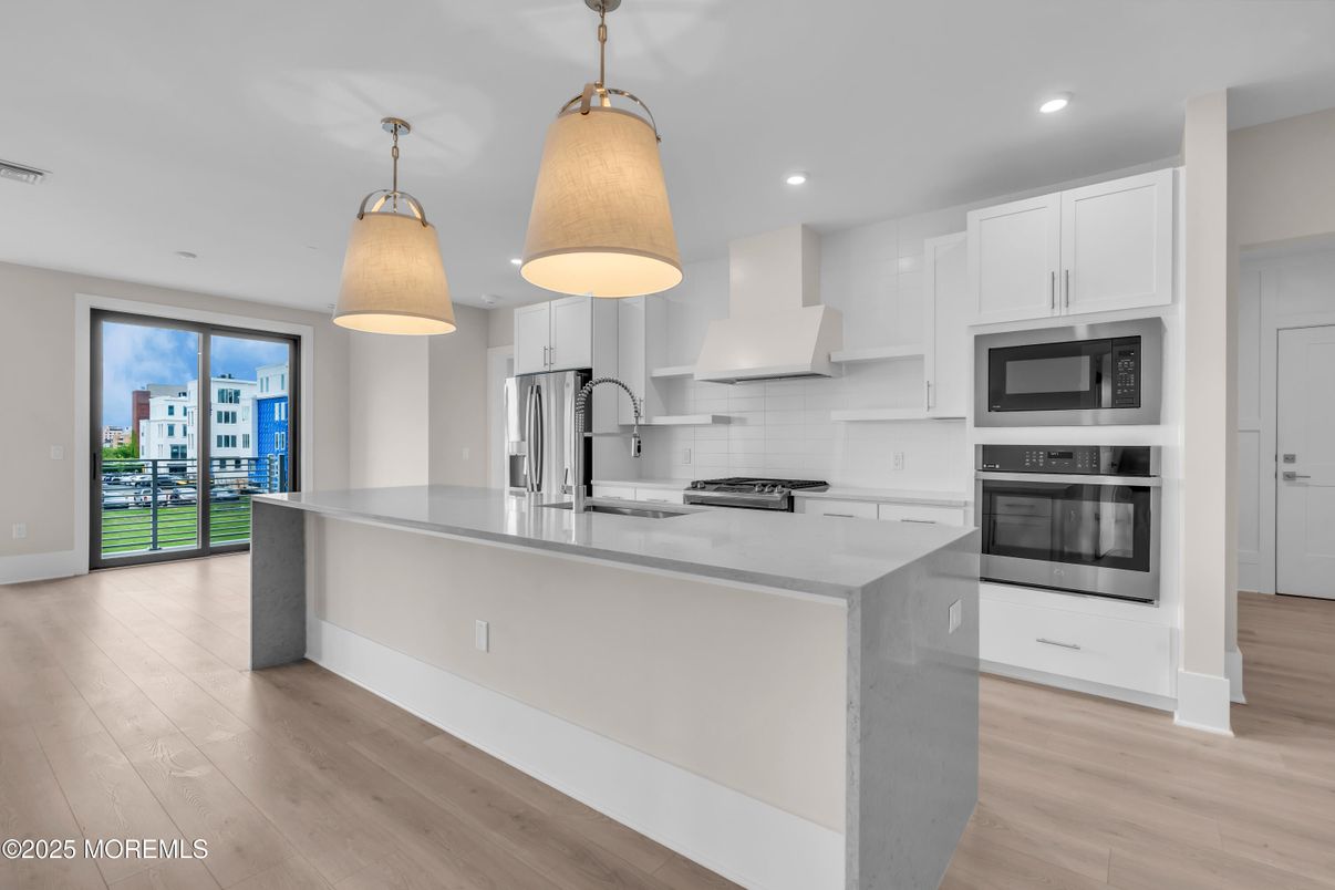 Interior, Kitchen, Pendant Lights, Recessed Lighting, Stainless Steel Appliances, Wood Texture Flooring