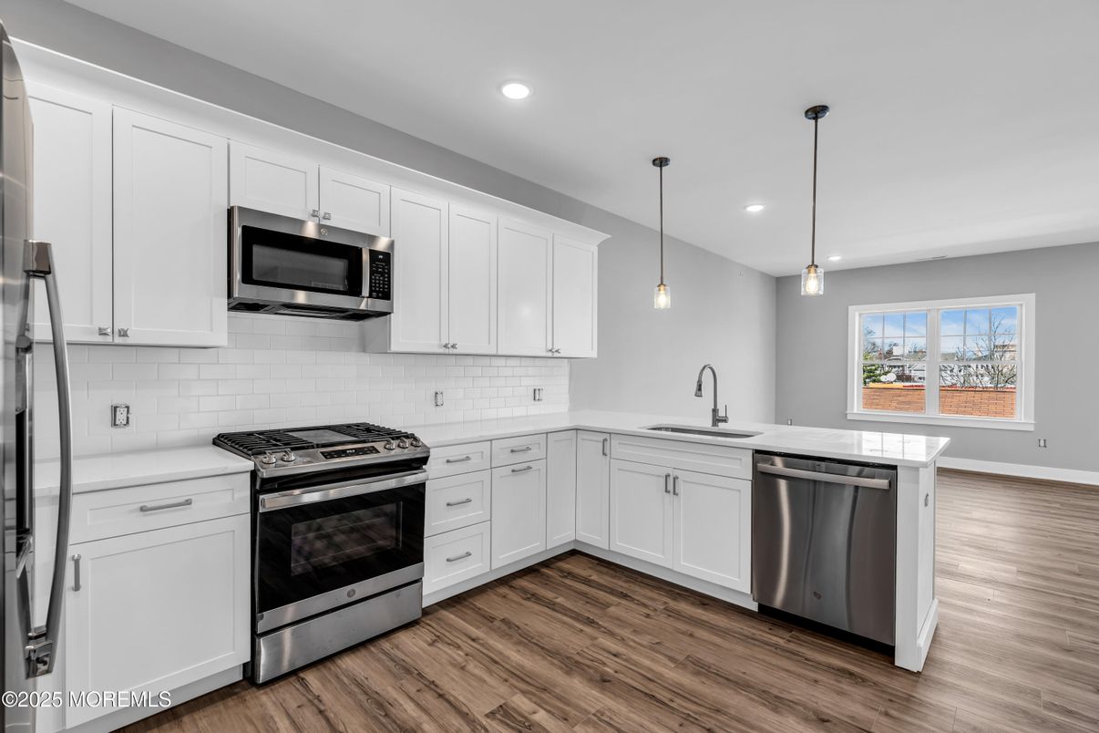 Interior, Kitchen, Pendant Lights, Recessed Lighting, Stainless Steel Appliances, Wood Texture Flooring