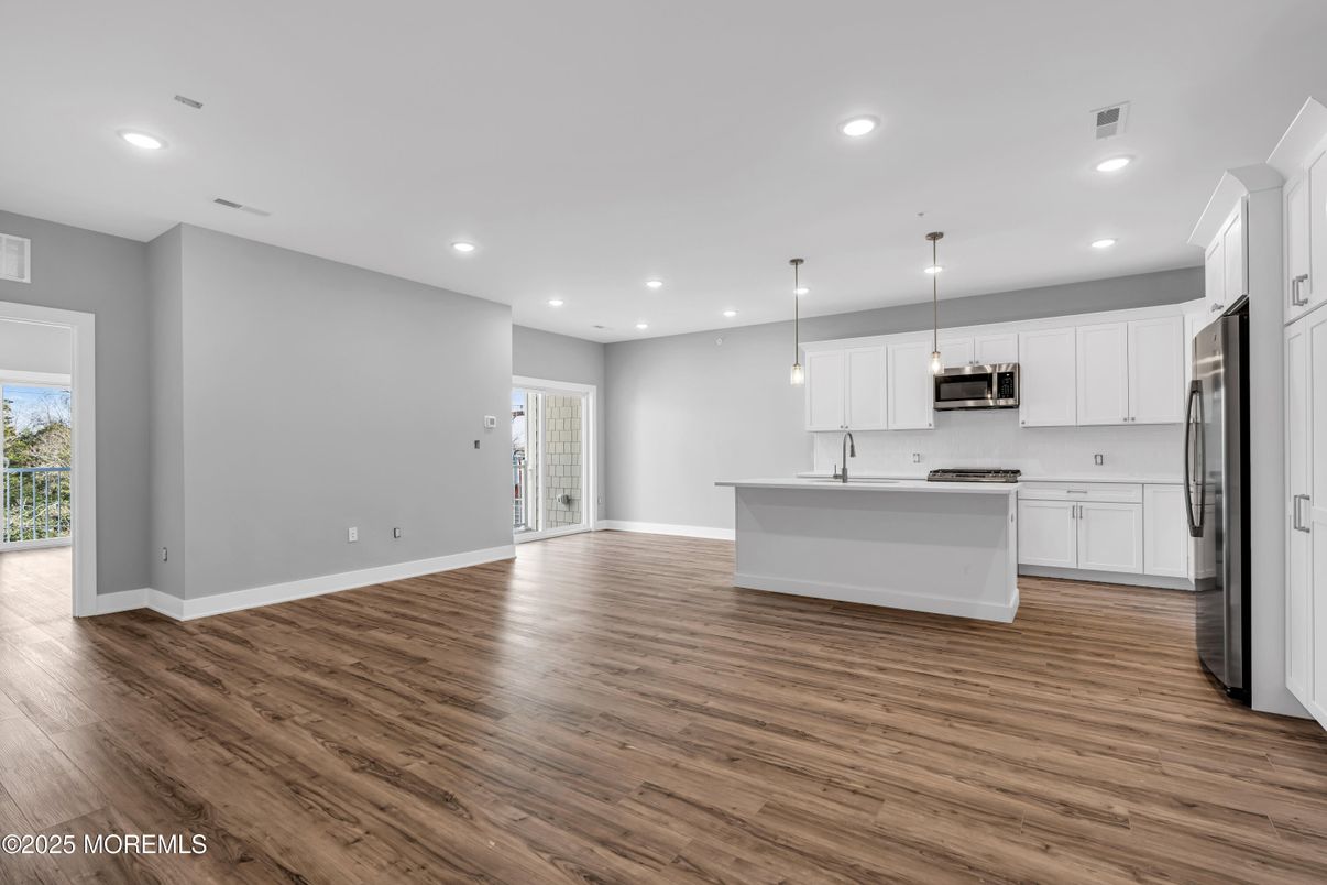 Interior, Kitchen, Pendant Lights, Recessed Lighting, Stainless Steel Appliances, Wood Texture Flooring