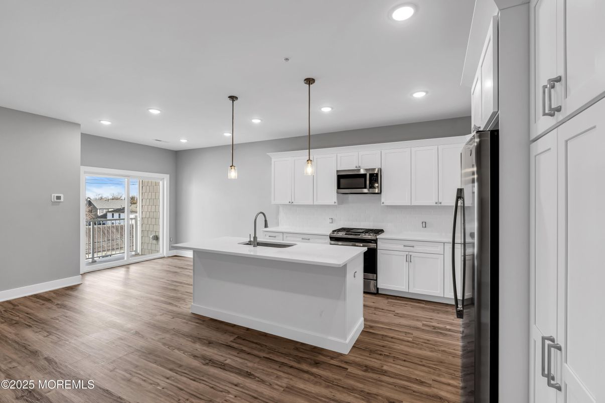 Interior, Kitchen, Pendant Lights, Recessed Lighting, Stainless Steel Appliances, Wood Texture Flooring