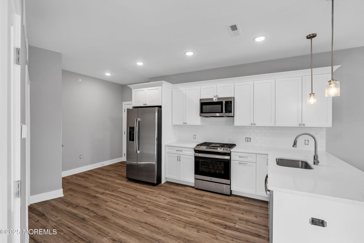 Interior, Kitchen, Pendant Lights, Recessed Lighting, Stainless Steel Appliances, Wood Texture Flooring
