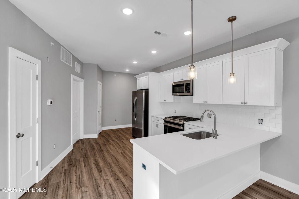 Interior, Kitchen, Pendant Lights, Recessed Lighting, Stainless Steel Appliances, Wood Texture Flooring