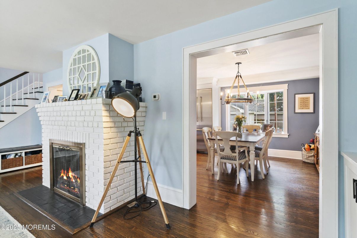 Chandelier, Dining room, Fireplace, Interior, Pendant Lights, Wood Texture Flooring